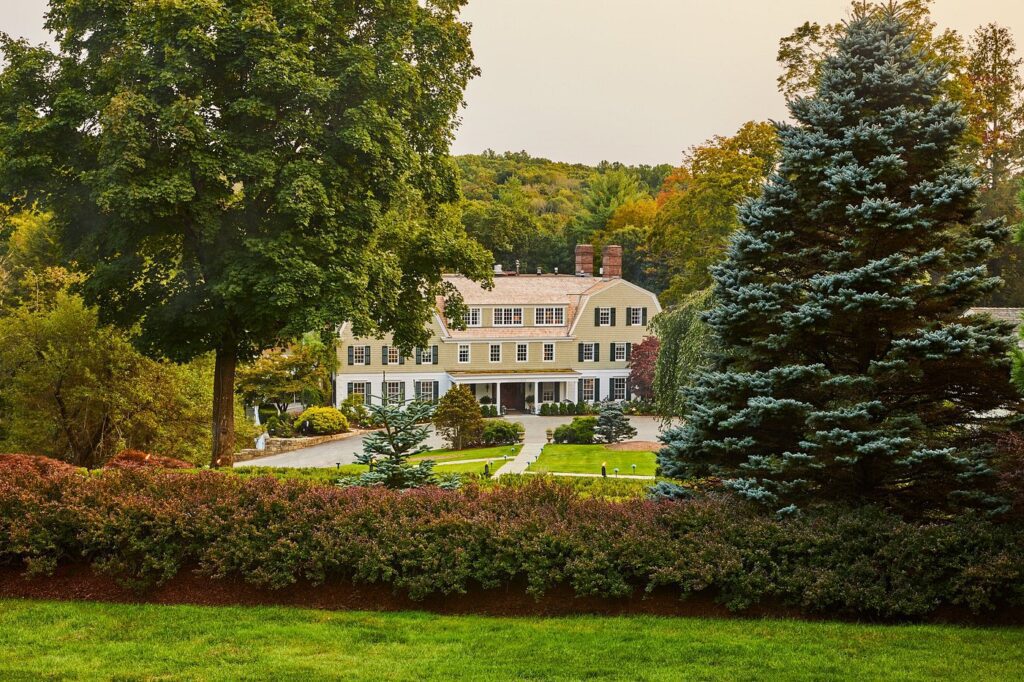 Grand exterior of Mayflower Inn & Spa, Auberge Resorts Collection, in the Connecticut countryside