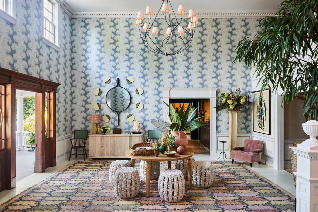 Sophisticated lobby at Mayflower Inn with rich wood accents and curated art pieces